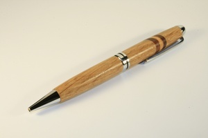 Classic pen in oak with chrome finish and aspen, olive & sapele inlay